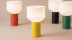 Set of colorful table lamps on a beige background