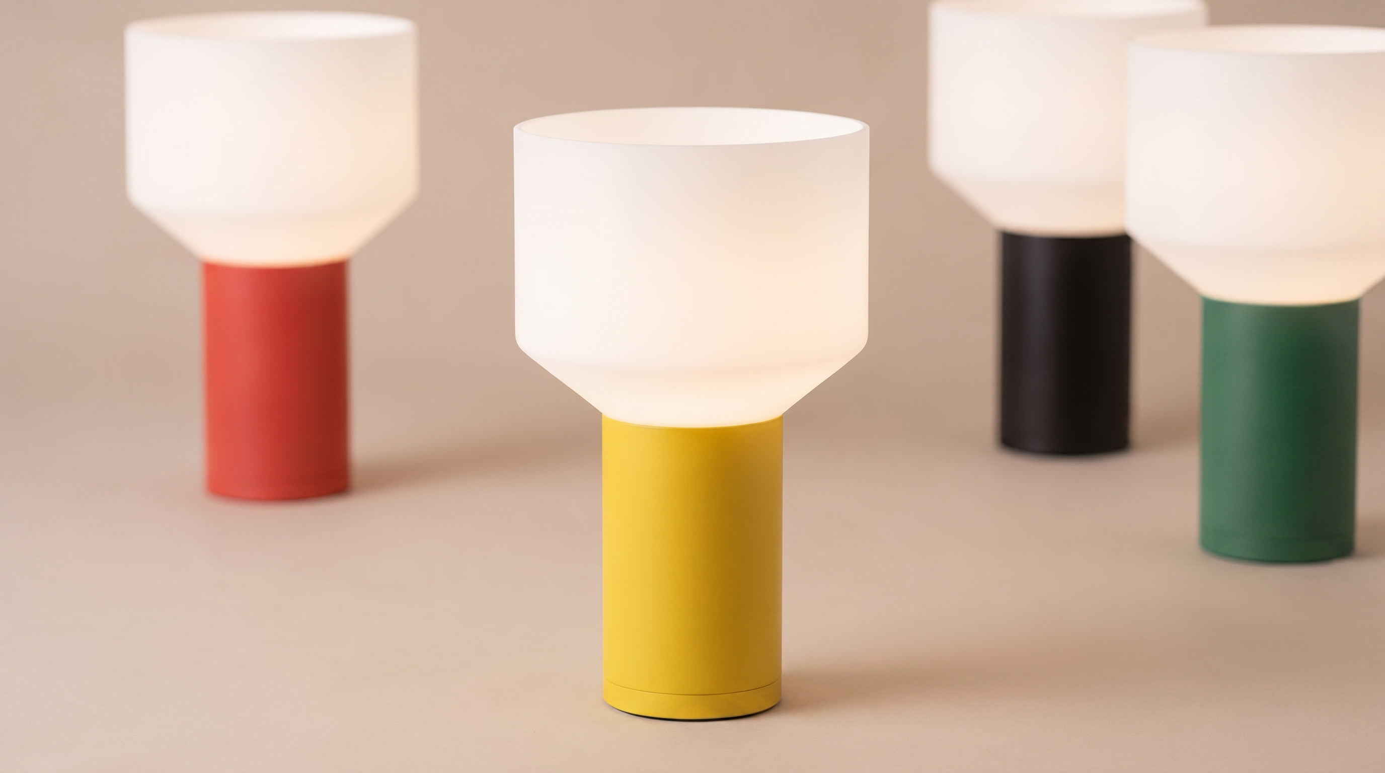Set of colorful table lamps on a beige background